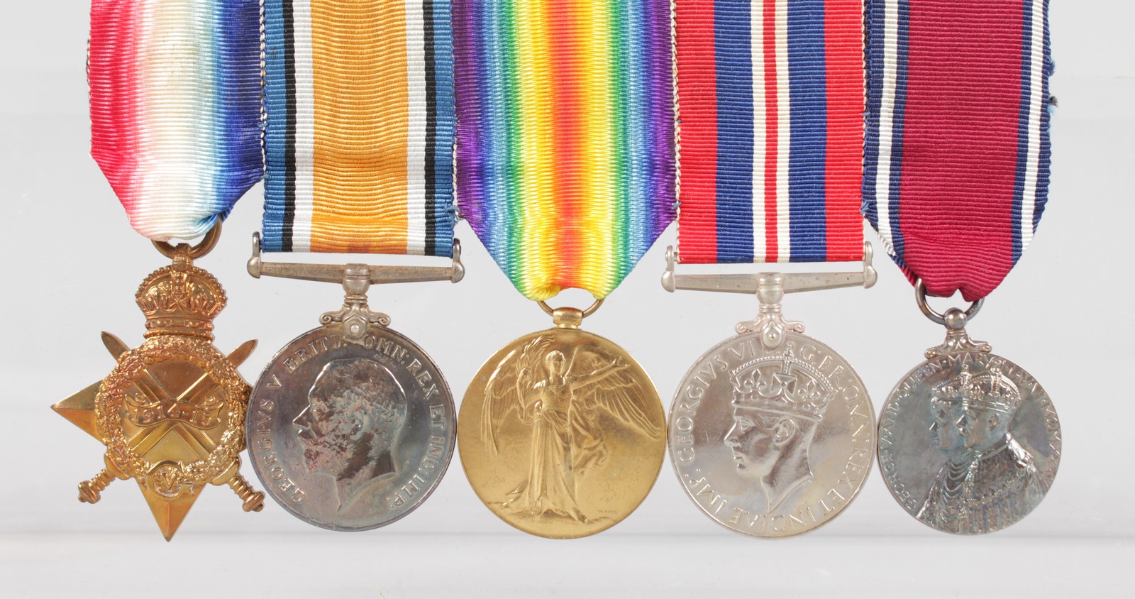 THE MEDALS OF CAPT. A. J. S. HUTTON R.E. 1914-1918 (3), 1910-1935, 1939-1941.