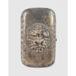 AN ENGRAVED RUSSIAN CIGARETTE CASE, repousse with flowers, engraved and dated 1881. 9cms long,