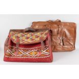 TWO LARGE BAGS, MOROCCAN SHOULDER BAG AND RED LEATHER BAG.