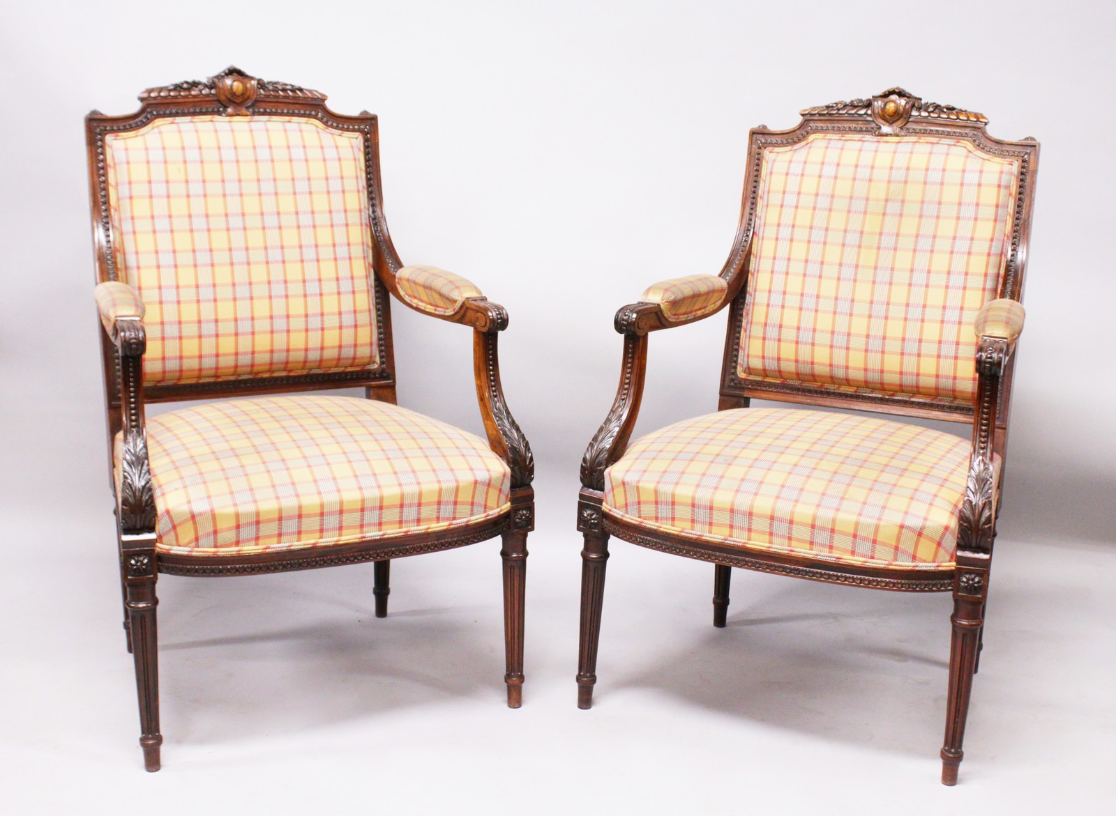 A GOOD PAIR OF LOUIS XV DESIGN ARMCHAIRS, CIRCA. 1880, carved cresting rails and arms, padded back