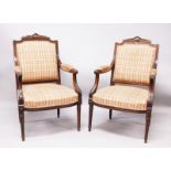 A GOOD PAIR OF LOUIS XV DESIGN ARMCHAIRS, CIRCA. 1880, carved cresting rails and arms, padded back