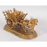 A RUSSIAN GILDED BRONZE HORSE AND CART. 8ins long.