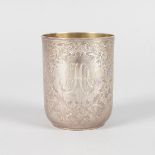 A SMALL RUSSIAN BEAKER, engraved with flowers. Initials AHA. 6cms high, stamped A.O. 1892 84.