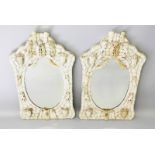 A SUPERB PAIR OF DIEPPE BONE MIRRORS with applied decoration of cupids, shields, lion and leaves,