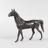 A PAINTED BRONZE HORSE. 6.5ins high.