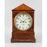 A LATE REGENCY MAHOGANY BRACKET CLOCK by J. WOOD, LONDON, with circular white dial, eight-day