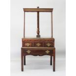 A GEORGE III OAK CLOTHES PRESS ON STAND, with screw thread upper section, over three small