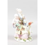 A GOOD 18TH CENTURY MEISSEN GROUP OF A CHINESE WOMAN, young boy on her knee with parrot at her side,