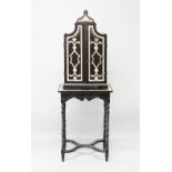 A SUPERB SMALL 18TH CENTURY ITALIAN EBONY AND IVORY CABINET ON STAND, the shaped top cabinet with