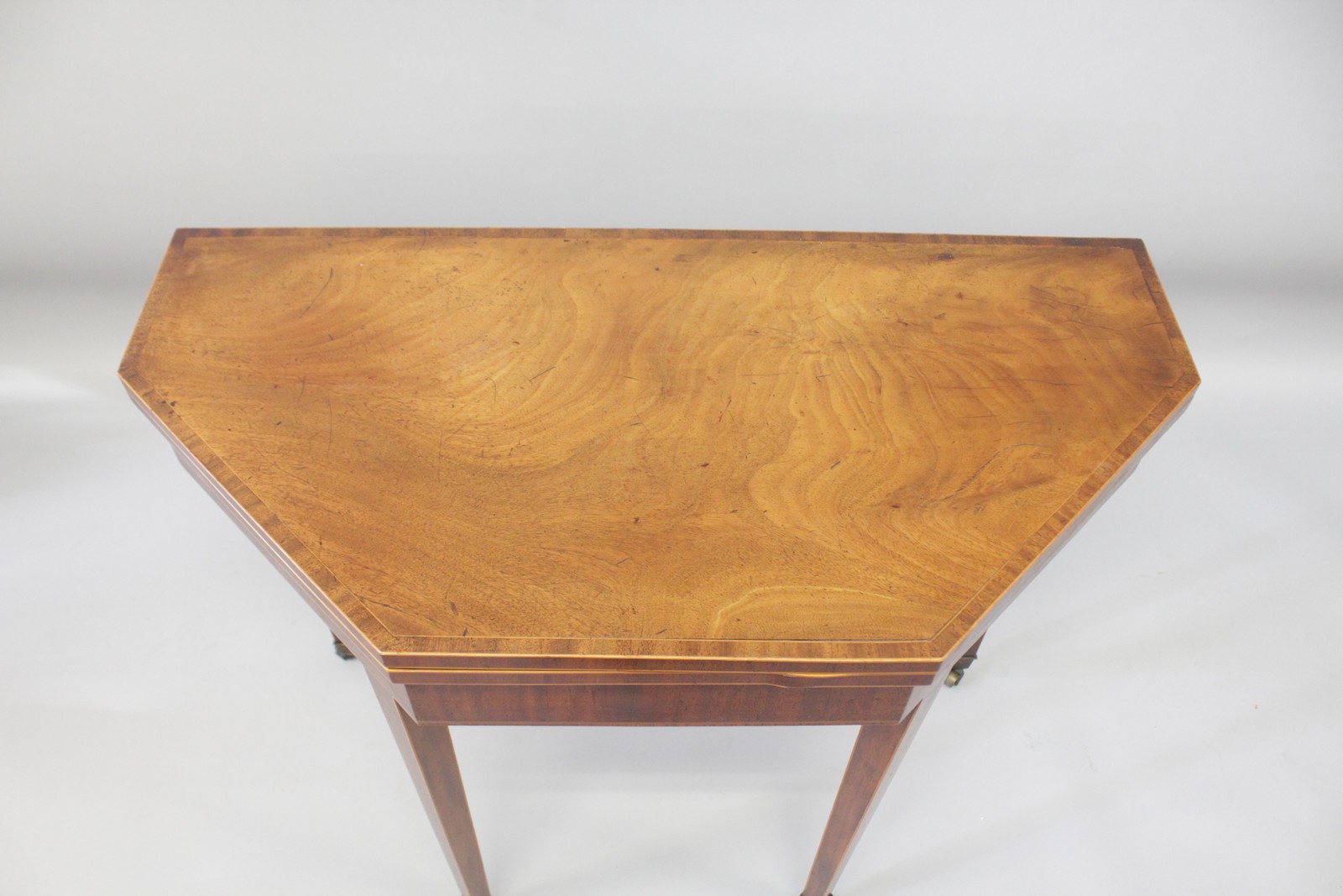 A GEORGE III MAHOGANY CARD TABLE, the fold-over top with crossbanded decoration on tapering square - Image 2 of 3