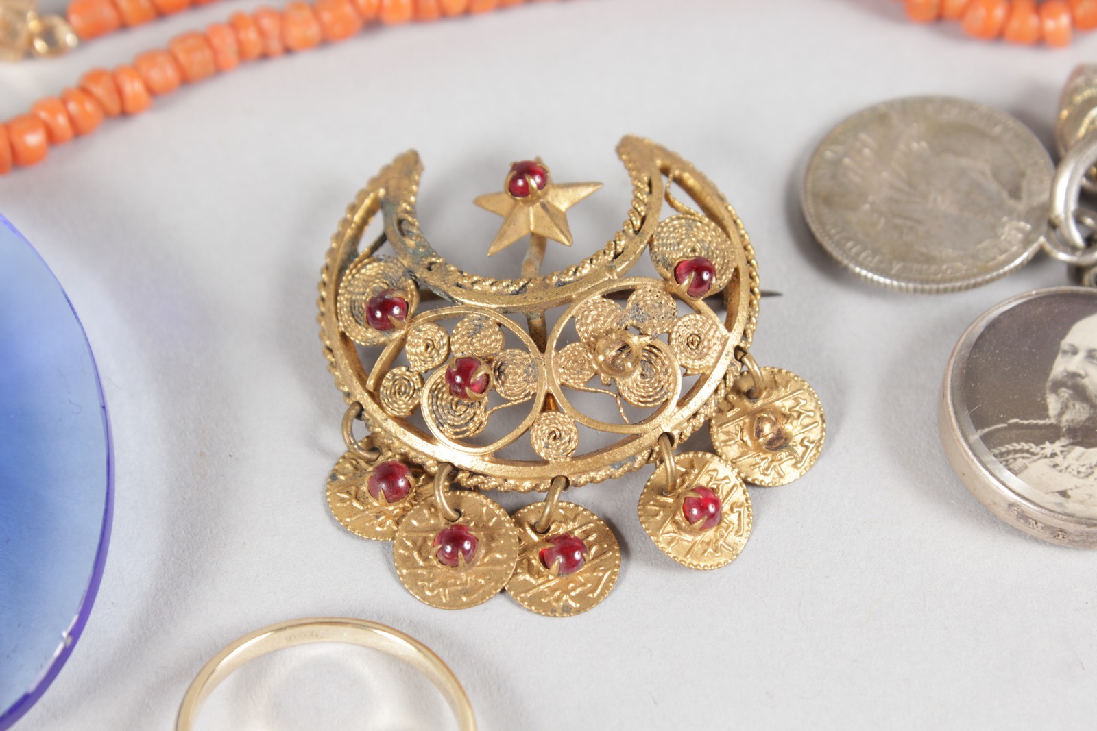 A FILIGREE BROOCH, three fobs, coral necklace, gold ring and pair of earrings. - Image 4 of 5