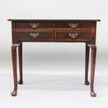 A GEORGE II MAHOGANY LOWBOY, with one long drawer, two short drawers on cabriole legs with pad feet.