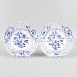 A PAIR OF MEISSEN BLUE & WHITE ONION PATTERN PLATES, 8ins diameter, with pierced borders. Cross