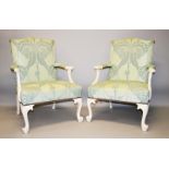 A GOOD LARGE PAIR OF WHITE PAINTED GEORGIAN DESIGN ARMCHAIRS with padded backs and seats, the