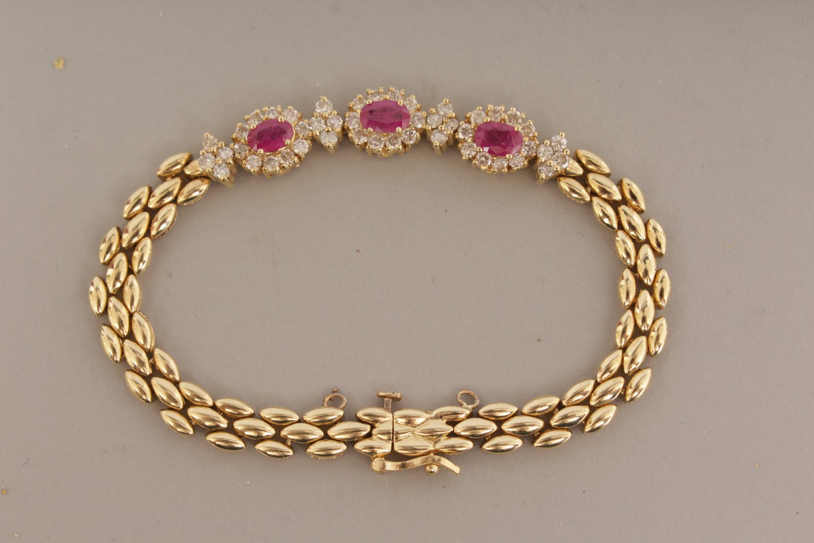 AN 18CT YELLOW GOLD, RUBY AND DIAMOND BRACELET. - Image 4 of 4