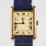 A LADIES SILVER GILT .925 CARTIER WRISTWATCH, with blue leather strap, No. 165329, in a red