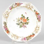 AN 18TH CENTURY CHELSEA SHAPED MOULDED PLATE painted with flowers, gold anchor mark.
