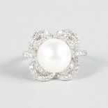 A LOVELY PEARL AND DIAMOND RING set in 18ct white gold.