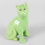 A SMALL GALLE TYPE POTTERY SEATED CAT. 6ins high.