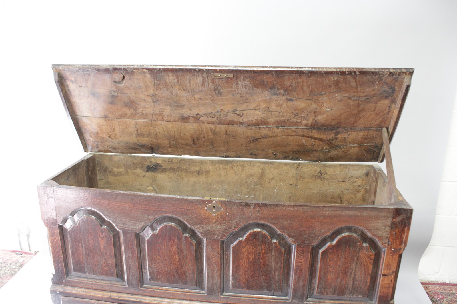 AN 18TH CENTURY OAK MARRIAGE CHEST, with rising top over four arched fielded panels, five drawers, - Image 2 of 2