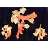 A VICTORIAN YELLOW GOLD AND CORAL BROOCH and PAIR OF EARRINGS, Circa. 1878, in blue velvet and