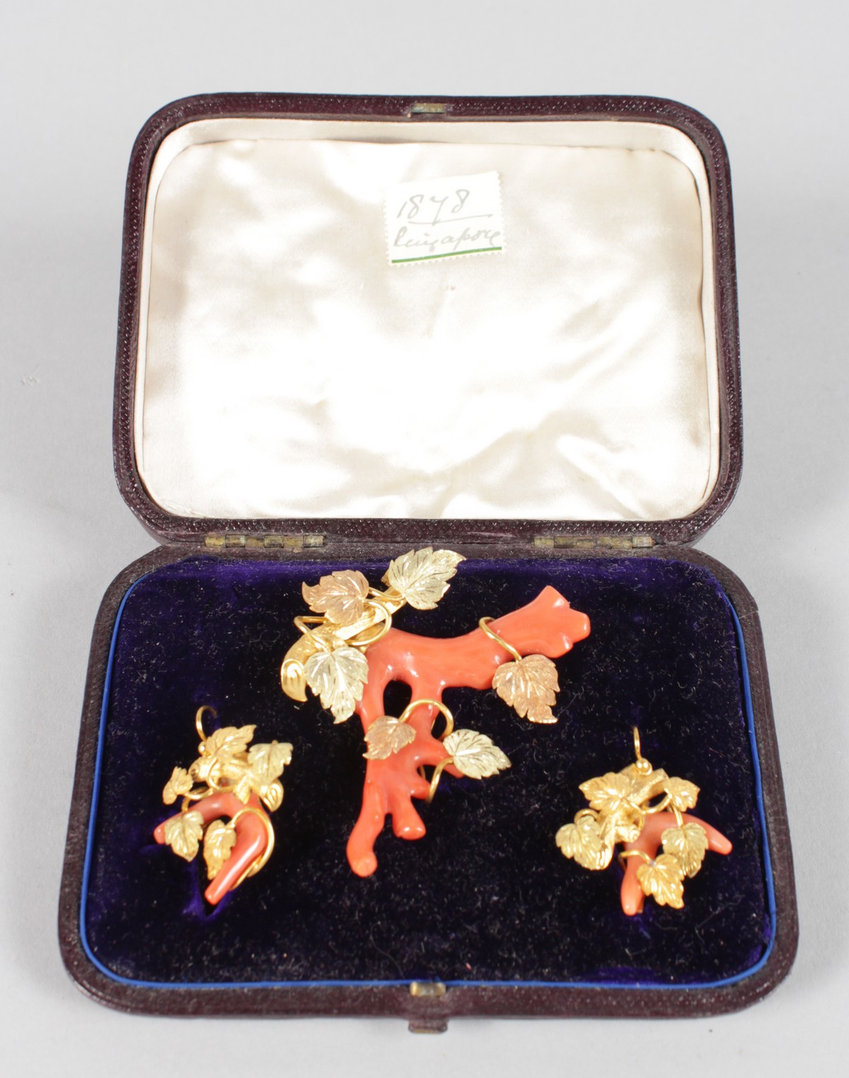 A VICTORIAN YELLOW GOLD AND CORAL BROOCH and PAIR OF EARRINGS, Circa. 1878, in blue velvet and - Image 2 of 2