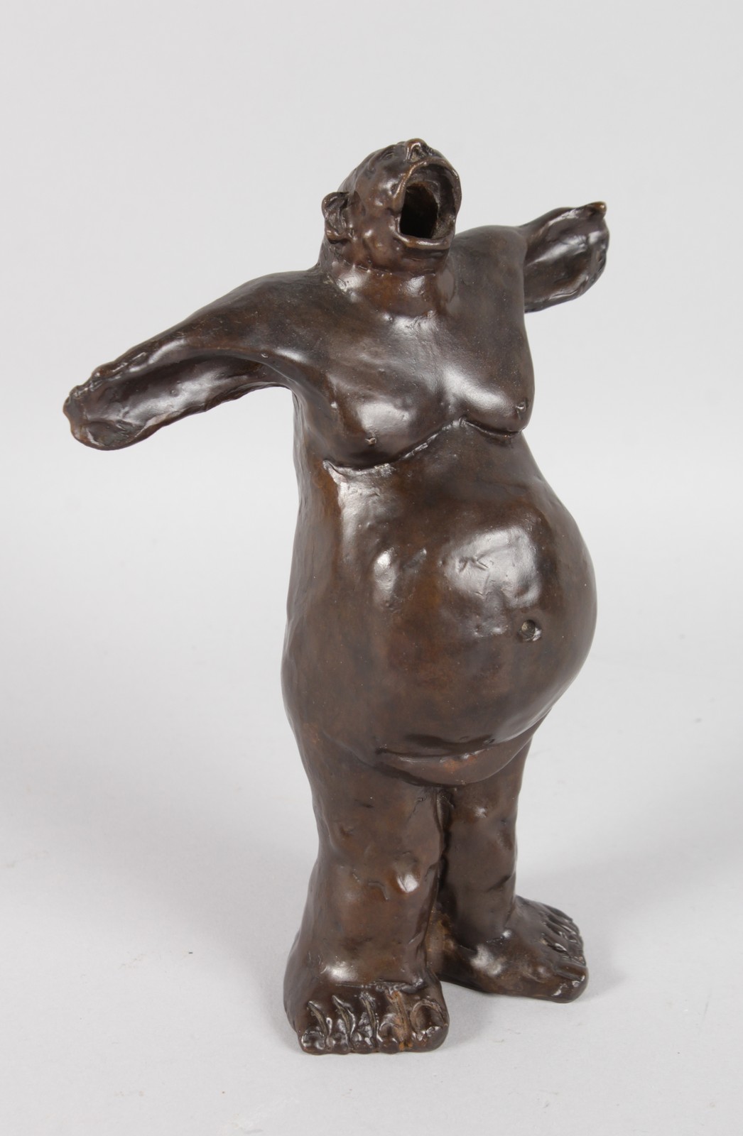 GUIDO MARIANI (CIRCA. 1990) ITALIAN A BRONZE STANDING YAWNING FAT POLAR BEAR TYPE FIGURE. Signed