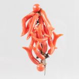 A VICTORIAN RED CORAL BROOCH.