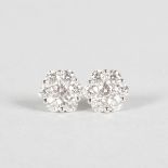 A GOOD PAIR OF DIAMOND CLUSTER EARRINGS, 1.20CTS, set in 18ct white gold.