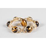 A GOOD TIGERS EYE RING AND BRACELET set in 9ct gold