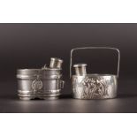 TWO SILVER OVAL PEPPERETTES AND SALTS.