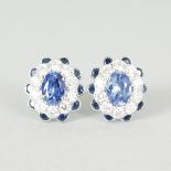 A SUPERB PAIR OF SAPPHIRE AND DIAMOND OVAL CLUSTER EARRINGS, 4.75CT total weight, set in 18ct