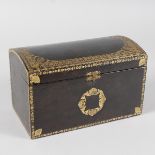 A DOMED LEATHER TOOLED STATIONERY BOX. 8ins wide.