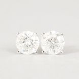 AN IMPRESSIVE PAIR F DIAMOND STUD EARRINGS, each of 2.25CTS, set in 18ct white gold.
