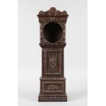 AN 18TH CENTURY CARVED WOOD MINIATURE LONGCASE CLOCK. 19ins high.