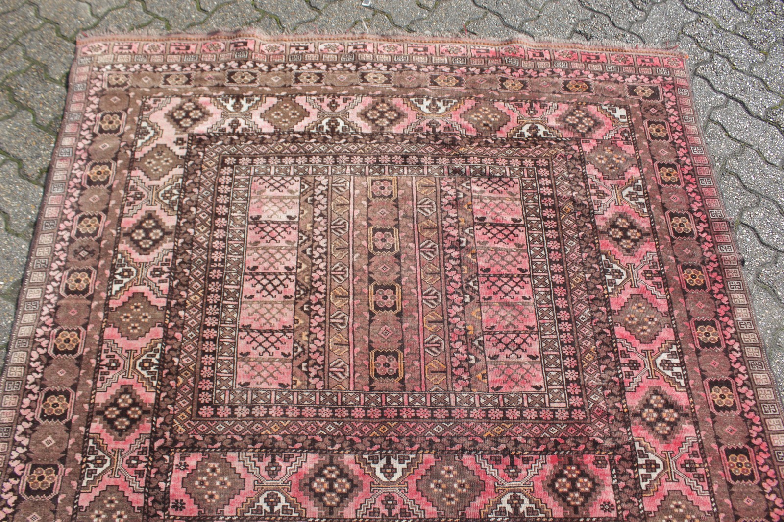 A PERSIAN CARPET, red ground with double central pattern, floral border. 7ft 6ins x 5ft 6ins. - Image 3 of 4