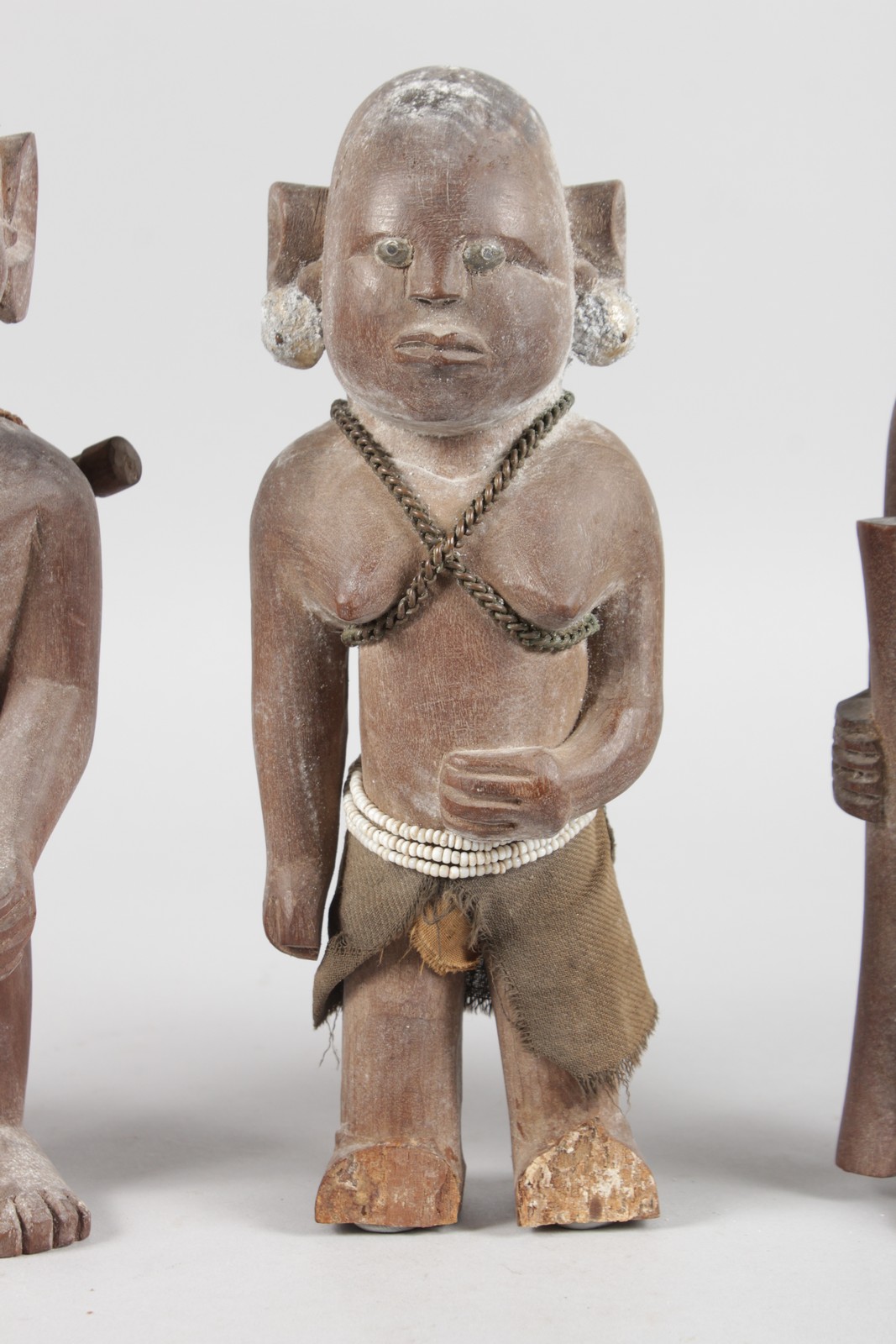 A SET OF FOUR ETHNIC CARVED WOOD TRIBAL FIGURES, some with original beadwork, 11ins high (2) and - Image 4 of 6