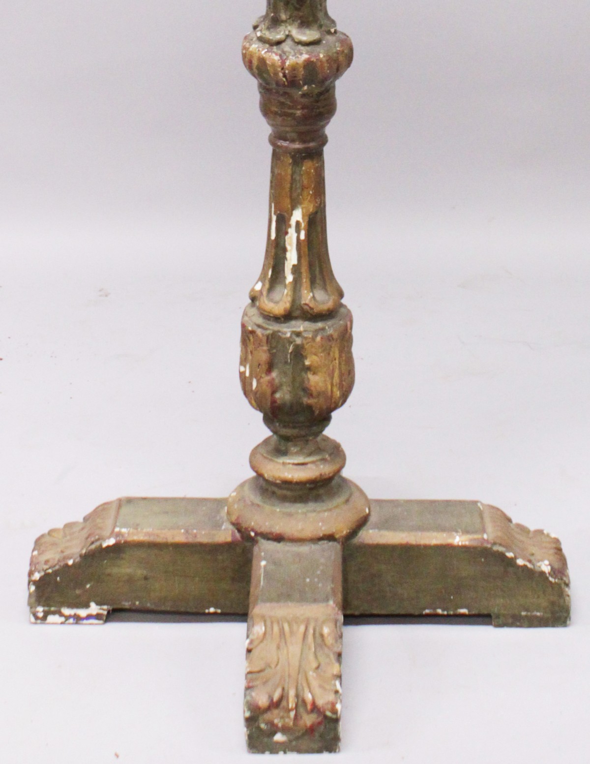 AN EARLY CARVED AND PAINTED PRICKET FLOOR STANDING CANDLESTICK, with circular top, leaf carved - Image 3 of 3