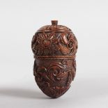 A GOOD COQUILLA CARVED NUT POMANDER. 6cms.