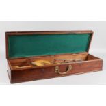 A 19TH CENTURY MAHOGANY BOX with brass carrying handle containing boxwood curves. 2ft 5ins long.