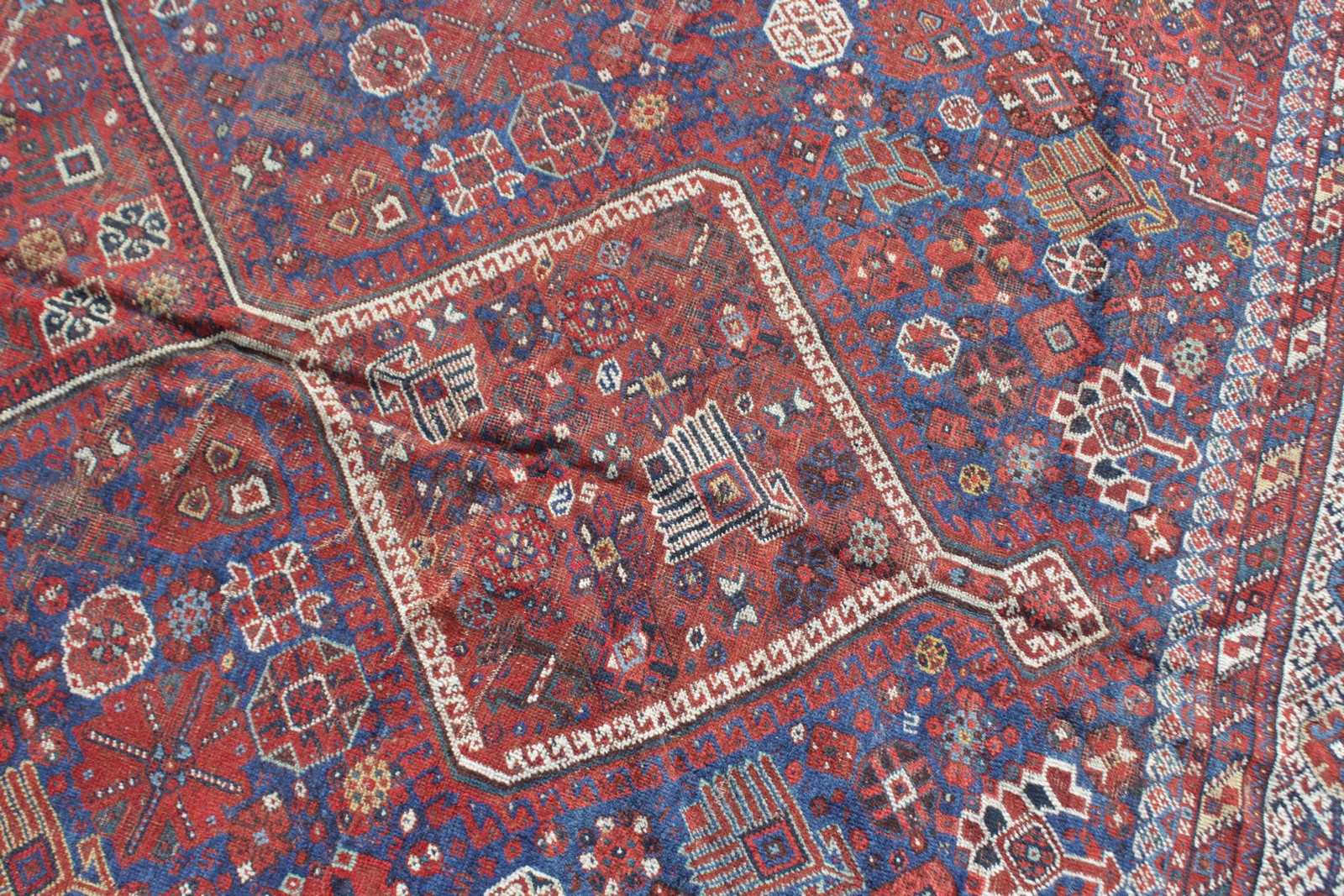 A PERSIAN DOUBLE BORDER RUG, salmon ground, 3ft 2ins x 2ft; together with a similar example. 2ft - Image 6 of 7