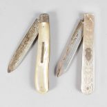 TWO MOTHER-OF-PEARL AND SILVER BLADED KNIVES. Sheffield 1898 and 1918.