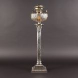 A PLATED CORINTHIAN COLUMN OIL LAMP. 25ins high.