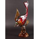 A COLOURED GLASS FISH. 15ins high.