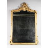 A FRENCH CIRCA. 1900 GILDED MIRROR. 43ins high.