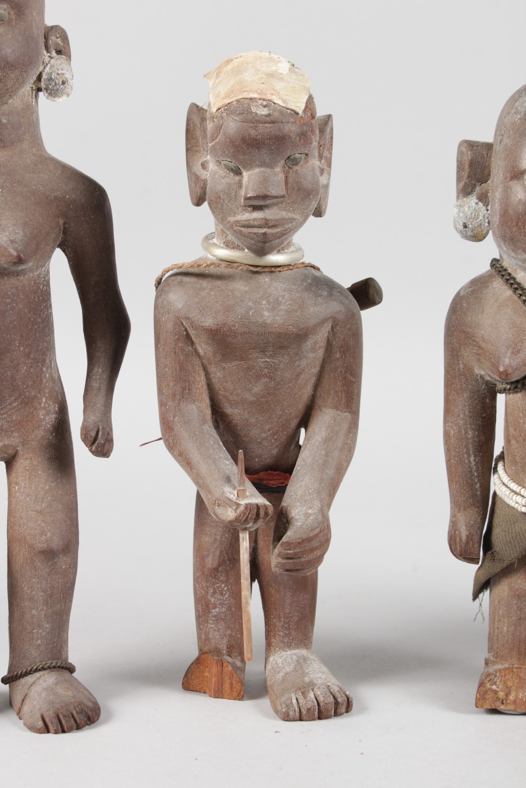 A SET OF FOUR ETHNIC CARVED WOOD TRIBAL FIGURES, some with original beadwork, 11ins high (2) and - Image 3 of 6