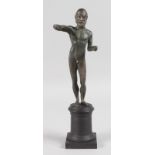 AFTER THE ANTIQUE A STANDING BRONZE NUDE on a wooden plinth. 11ins high.