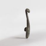 A SMALL CHINESE BRONZE CLIP. 8.5cms long.