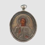 A RUSSIAN MINIATURE OVAL TRAVELLING ICON. 4.5cms x 4cms.