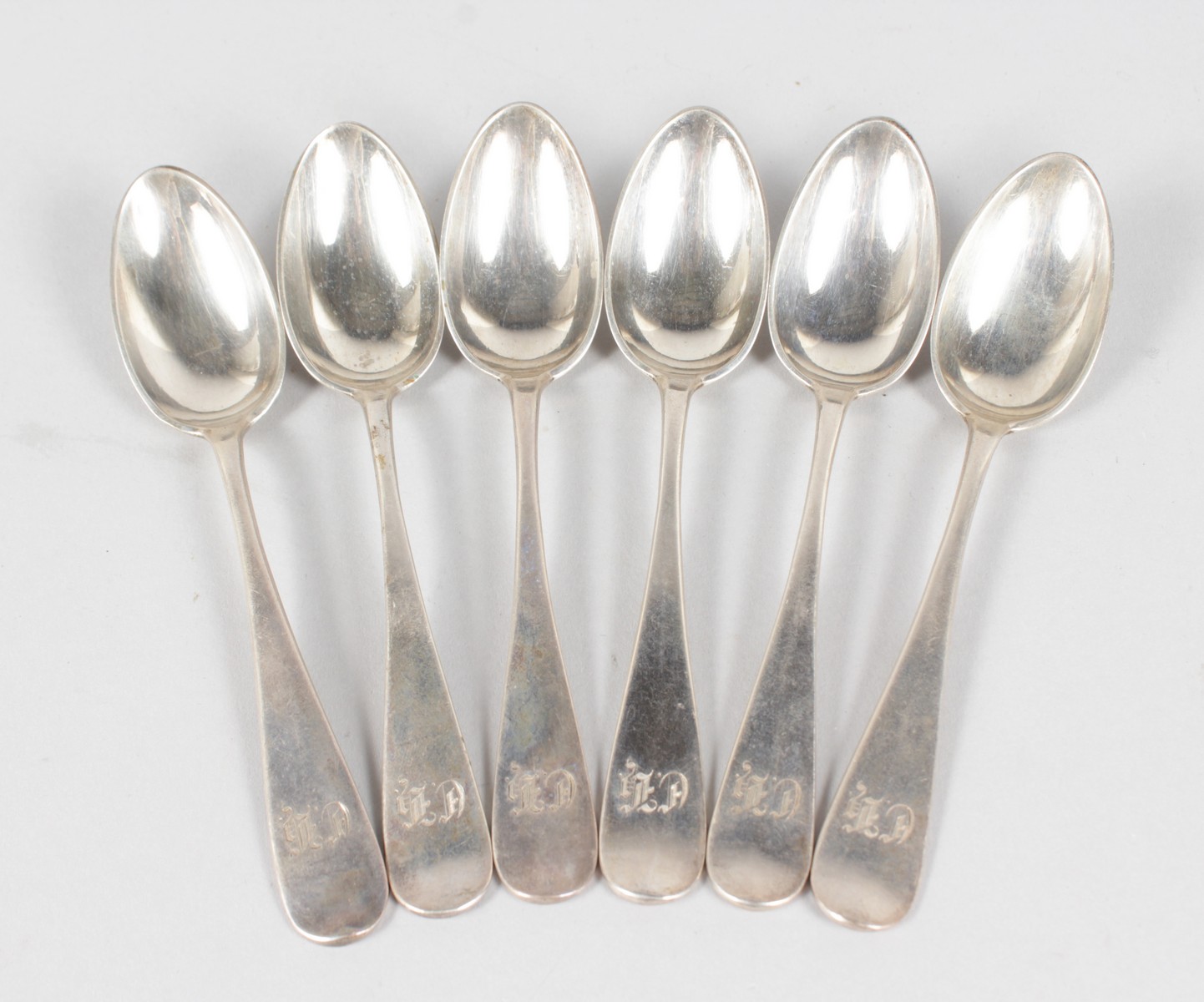 A SET OF SIX RUSSIAN SILVER TEASPOONS. Stamped AO A.C. 1873 84. St George and the Dragon.